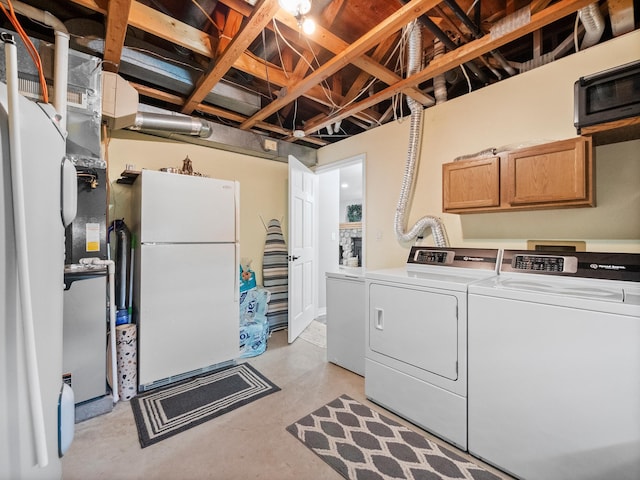 10823 Big Chip Rd NW, Brandon Twp, MN 56315 - laundry area featuring washing machine and dryer and cabinet space