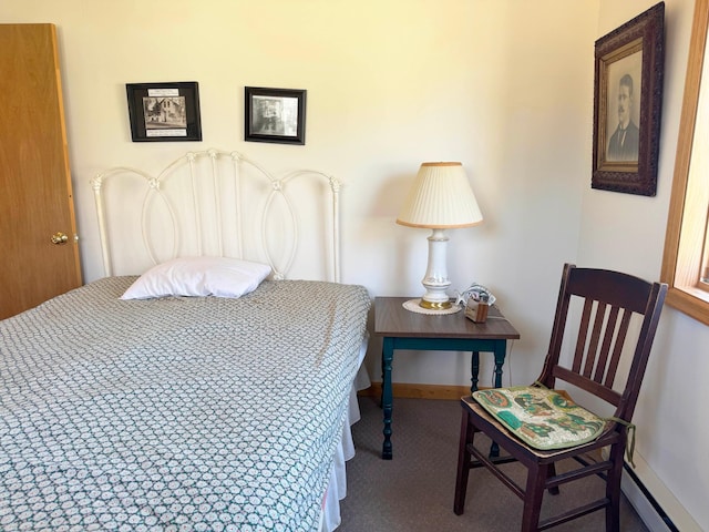 5301 Oak St, Isle, MN 56342 - bedroom with baseboards and a baseboard heating unit