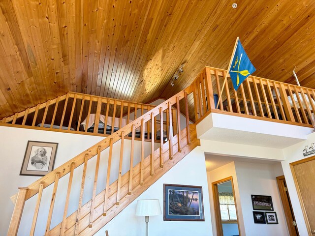 5301 Oak St, Isle, MN 56342 - stairs featuring high vaulted ceiling and wood ceiling