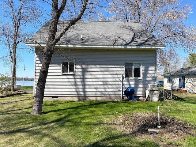 5301 Oak St, Isle, MN 56342 - view of property exterior featuring crawl space, a water view, and a lawn