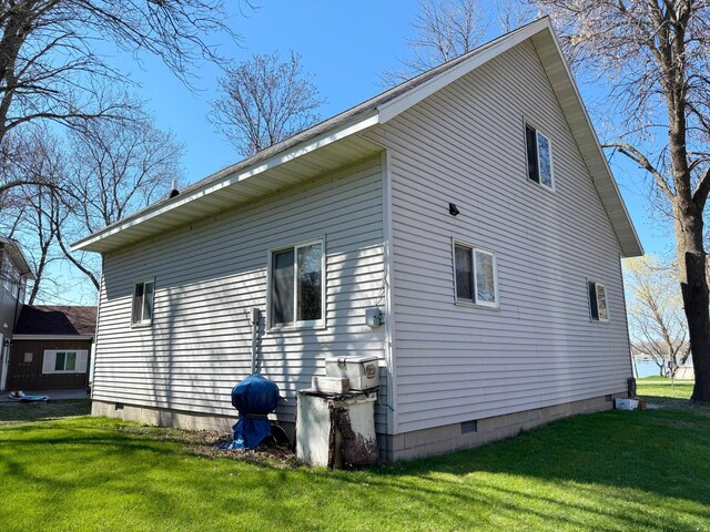 5301 Oak St, Isle, MN 56342 - view of property exterior with crawl space and a yard