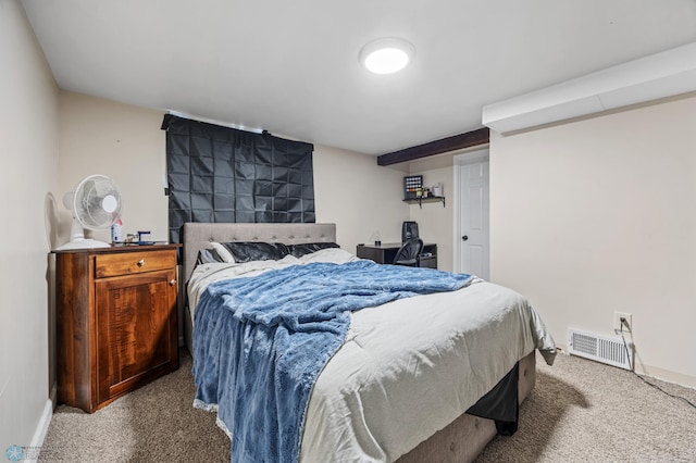 bedroom featuring carpet floors and baseboards