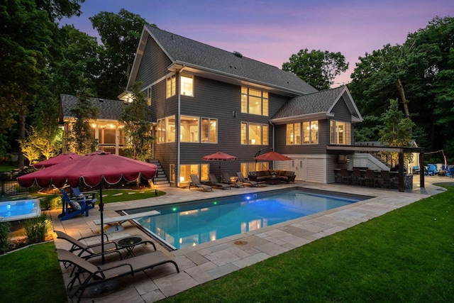 8622 French Curv, Eden Prairie, MN 55347 - back of property featuring stairway, a yard, an outdoor hangout area, and an outdoor pool
