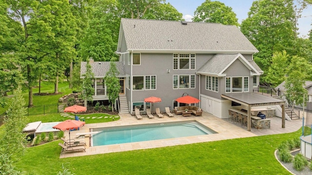 8622 French Curv, Eden Prairie, MN 55347 - back of property with stairs, an outdoor hangout area, an outdoor pool, and a patio area