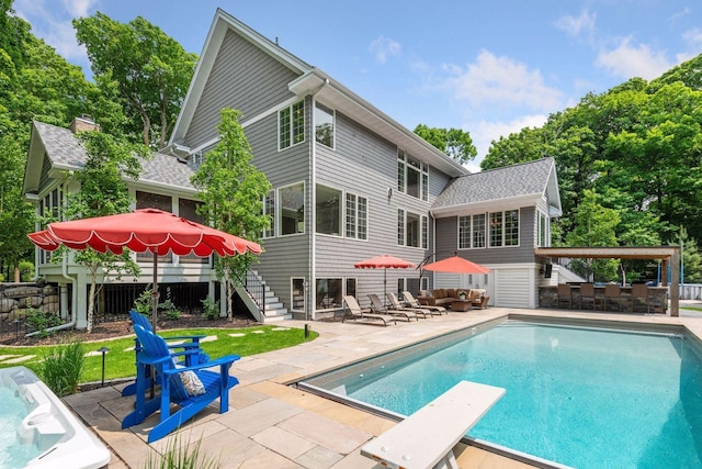 8622 French Curv, Eden Prairie, MN 55347 - back of house featuring a patio, stairs, and an outdoor hangout area