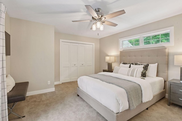 8622 French Curv, Eden Prairie, MN 55347 - bedroom featuring light carpet, a closet, baseboards, and ceiling fan