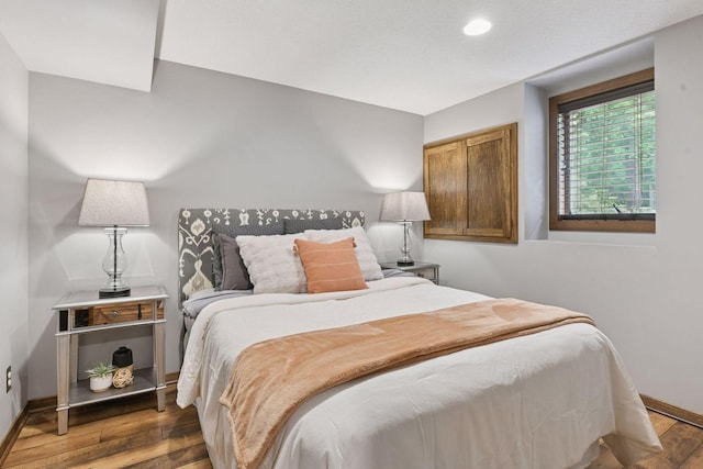 8622 French Curv, Eden Prairie, MN 55347 - bedroom featuring wood finished floors, baseboards, and recessed lighting