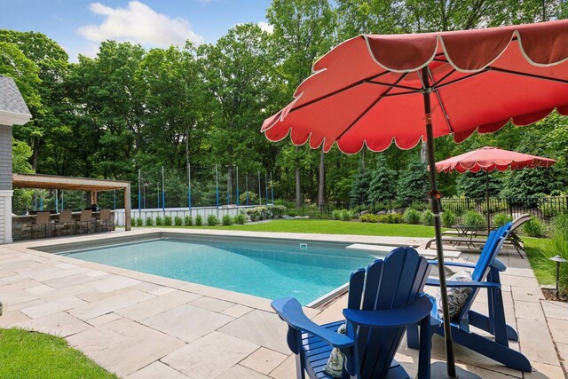 8622 French Curv, Eden Prairie, MN 55347 - view of swimming pool featuring a patio and view of scattered trees