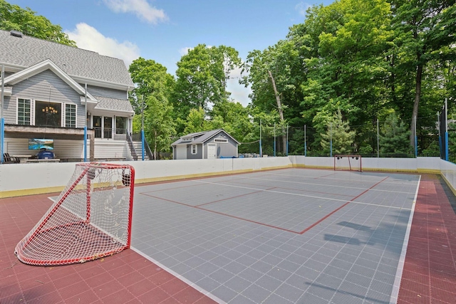 8622 French Curv, Eden Prairie, MN 55347 - view of tennis court with community basketball court, an area for soccer, and view of wooded area