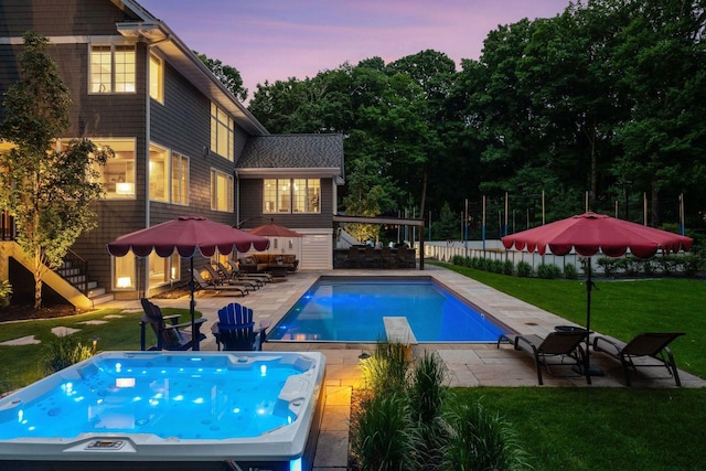 8622 French Curv, Eden Prairie, MN 55347 - pool at dusk with a yard, a patio area, and stairway