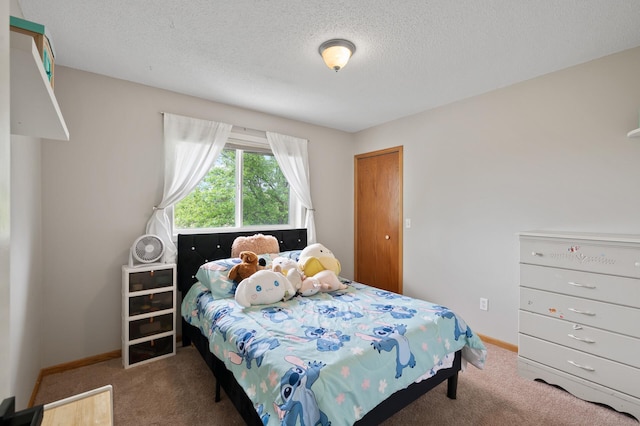 14380 Geneva Ave N, Hugo, MN 55038 - bedroom featuring carpet flooring, a textured ceiling, and baseboards