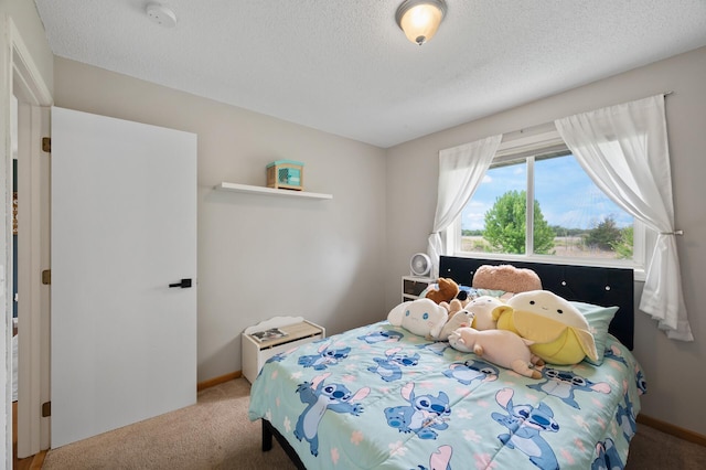 14380 Geneva Ave N, Hugo, MN 55038 - carpeted bedroom featuring a textured ceiling and baseboards