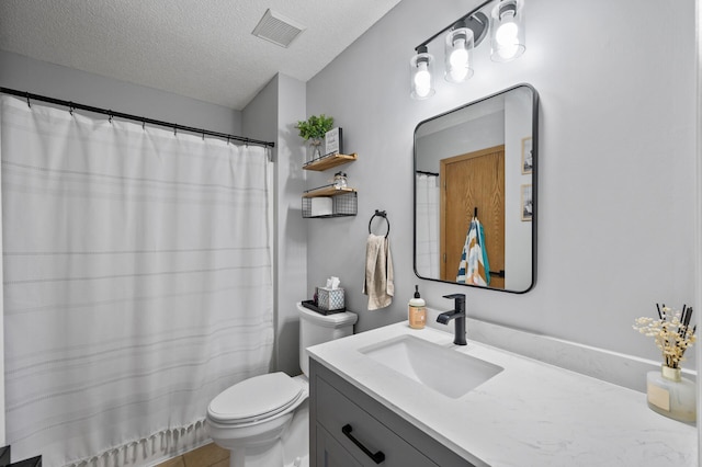 14380 Geneva Ave N, Hugo, MN 55038 - full bathroom with a textured ceiling, toilet, and vanity
