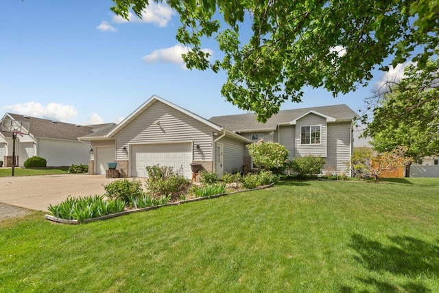 1320 18th St SE, Owatonna, MN 55060 - single story home with a garage, concrete driveway, a front lawn, and brick siding
