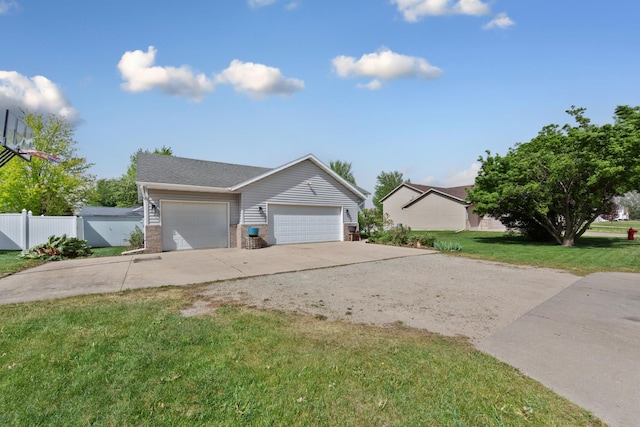1320 18th St SE, Owatonna, MN 55060 - view of front of house featuring brick siding, concrete driveway, and an attached garage