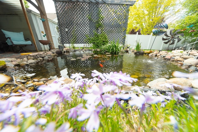 1320 18th St SE, Owatonna, MN 55060 - view of yard with a garden pond
