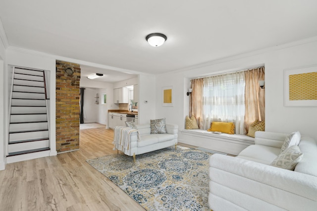 1775 Morgan Ave, Saint Paul, MN 55116 - living area with light wood-style floors, stairs, and crown molding