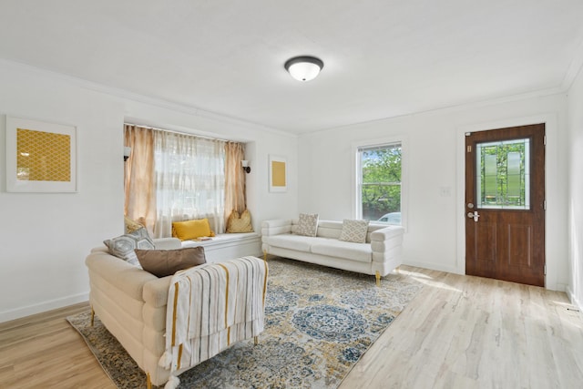 1775 Morgan Ave, Saint Paul, MN 55116 - living room with ornamental molding, wood finished floors, and baseboards