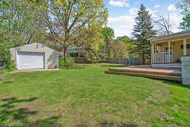 1775 Morgan Ave, Saint Paul, MN 55116 - view of yard featuring a detached garage, an outbuilding, and a deck