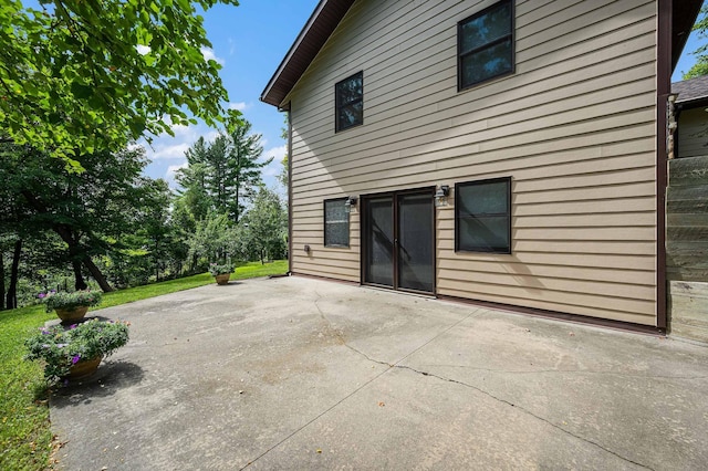 rear view of property with a patio area