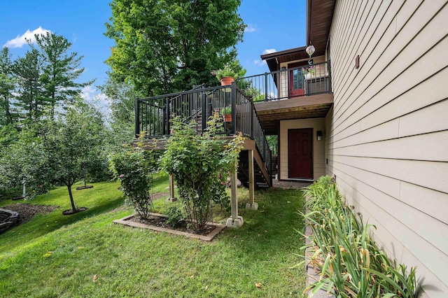 view of yard featuring stairway and a wooden deck