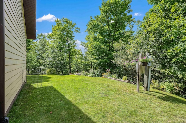 view of yard with fence