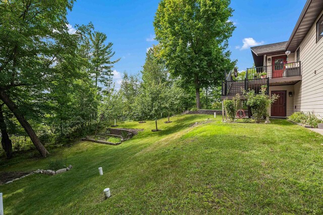 33627 Deer Lake Ln, Grand Rapids, MN 55744 - view of green lawn with a balcony