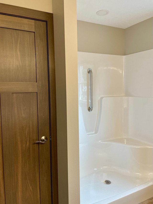 full bath featuring walk in shower
