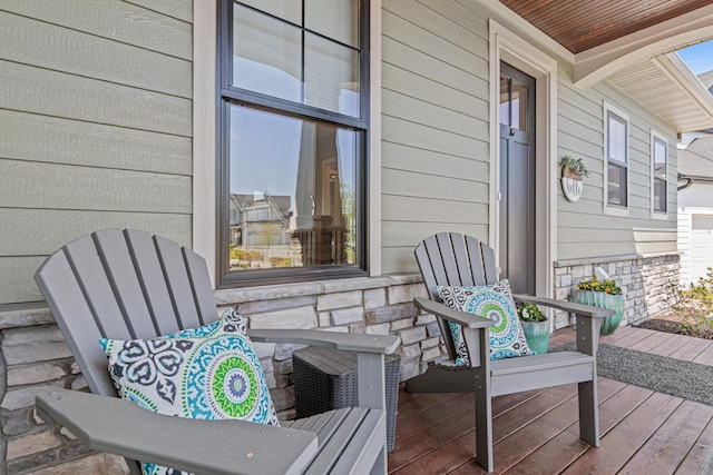 4152 Hummingbird Ct N, Lake Elmo, MN 55042 - wooden deck with covered porch