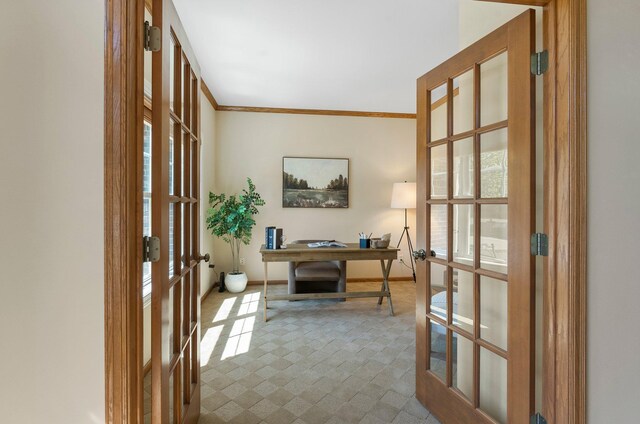 carpeted office with french doors, crown molding, and baseboards