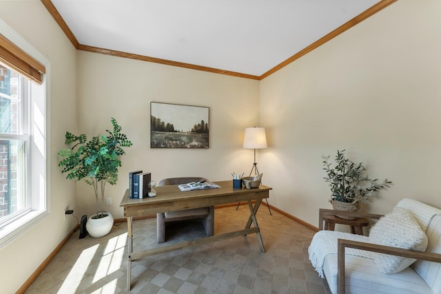 office with healthy amount of natural light, baseboards, ornamental molding, and light colored carpet