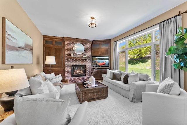 living room featuring a fireplace