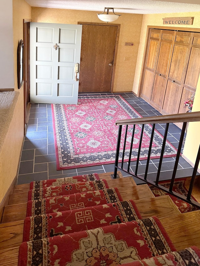 7864 Demontreville Trl N, Lake Elmo, MN 55042 - entryway with dark tile patterned flooring