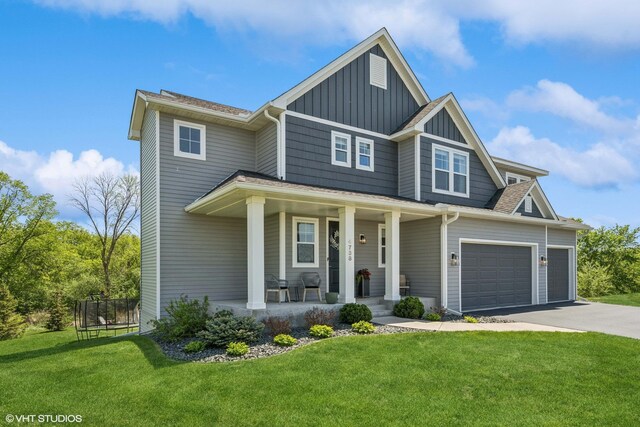 4738 Maas Ct, Minnetrista, MN 55375 - craftsman inspired home with board and batten siding, covered porch, driveway, and a front yard