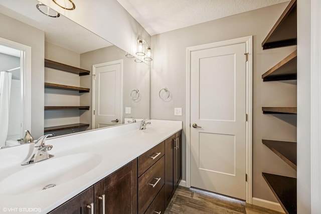4738 Maas Ct, Minnetrista, MN 55375 - full bath featuring wood finished floors, double vanity, and baseboards