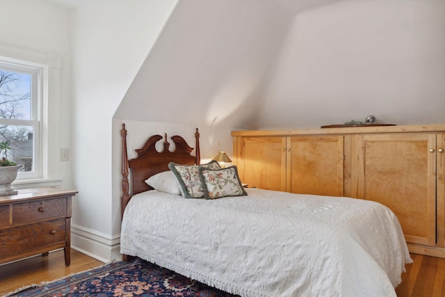 1203 Mount Curve Ave, Minneapolis, MN 55403 - bedroom featuring light wood-style flooring