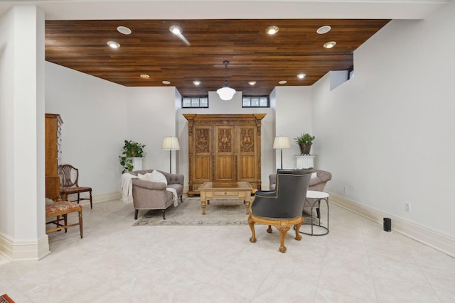1203 Mount Curve Ave, Minneapolis, MN 55403 - sitting room featuring baseboards, tile patterned floors, recessed lighting, and wood ceiling
