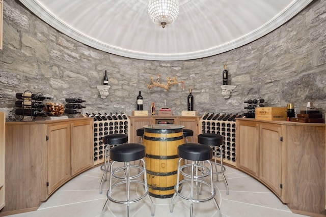 1203 Mount Curve Ave, Minneapolis, MN 55403 - wine area with light tile patterned floors and a bar