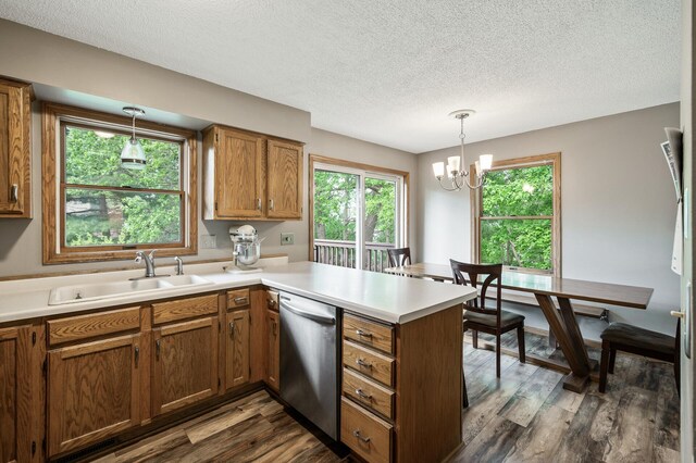 14250 Upper 54th St N, Oak Park Heights, MN 55082 - kitchen featuring a sink, dishwasher, a peninsula, brown cabinetry, and dark wood-type flooring