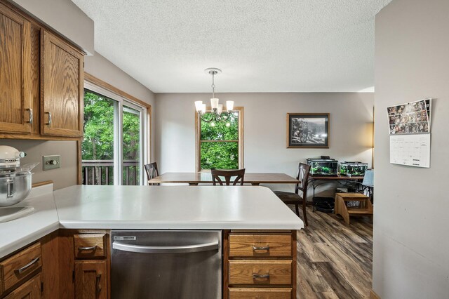14250 Upper 54th St N, Oak Park Heights, MN 55082 - kitchen with dishwasher, a peninsula, a textured ceiling, dark wood finished floors, and a chandelier