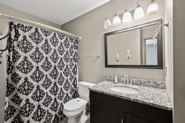 14250 Upper 54th St N, Oak Park Heights, MN 55082 - bathroom featuring a textured ceiling, toilet, vanity, and a shower with shower curtain