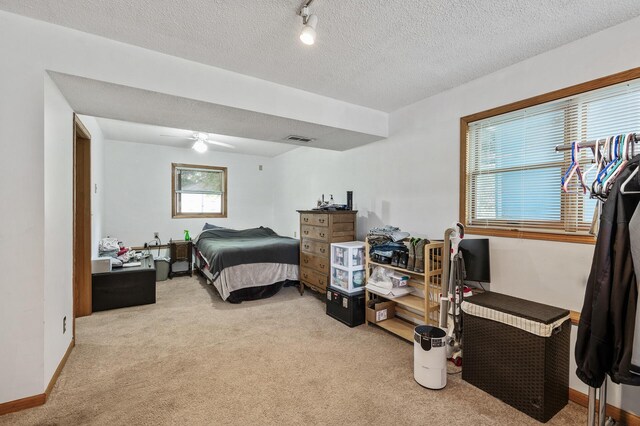 14250 Upper 54th St N, Oak Park Heights, MN 55082 - bedroom featuring carpet, a ceiling fan, a textured ceiling, and baseboards