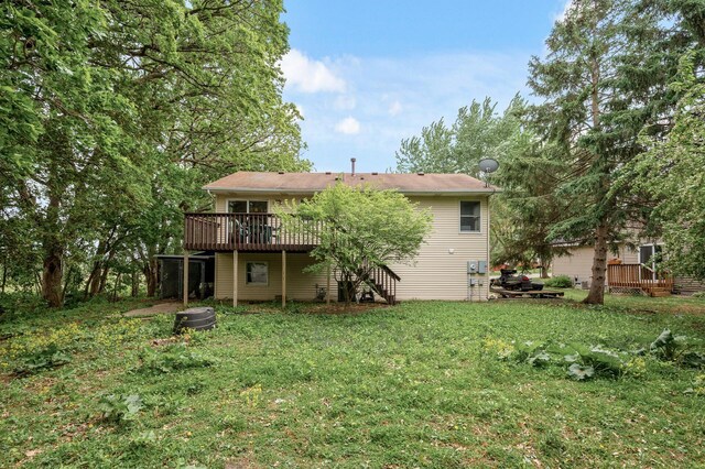 14250 Upper 54th St N, Oak Park Heights, MN 55082 - back of property with a deck and a yard