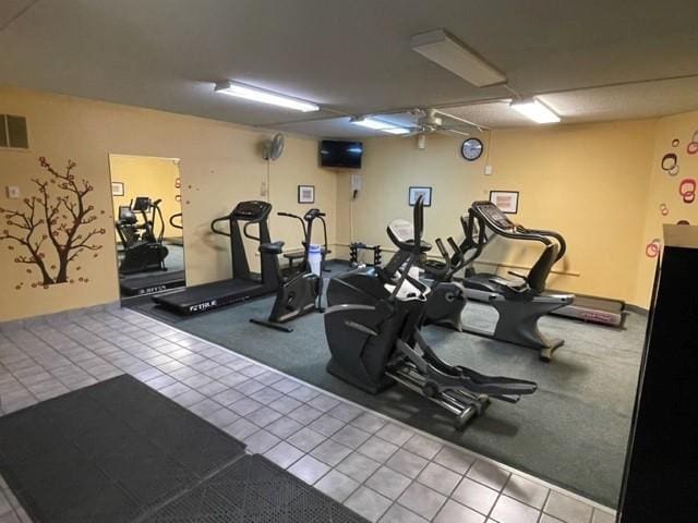 gym with visible vents and tile patterned floors