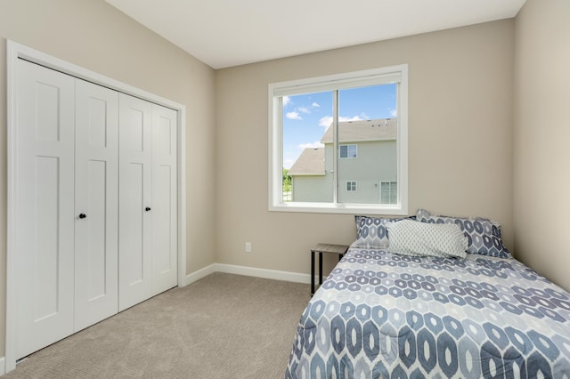 7107 184th St W, Lakeville, MN 55044 - bedroom featuring carpet flooring, baseboards, and a closet