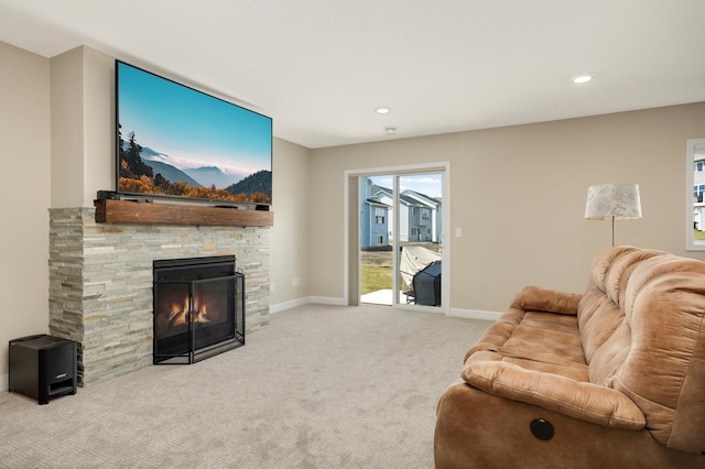 7107 184th St W, Lakeville, MN 55044 - carpeted living room featuring a fireplace, baseboards, and recessed lighting