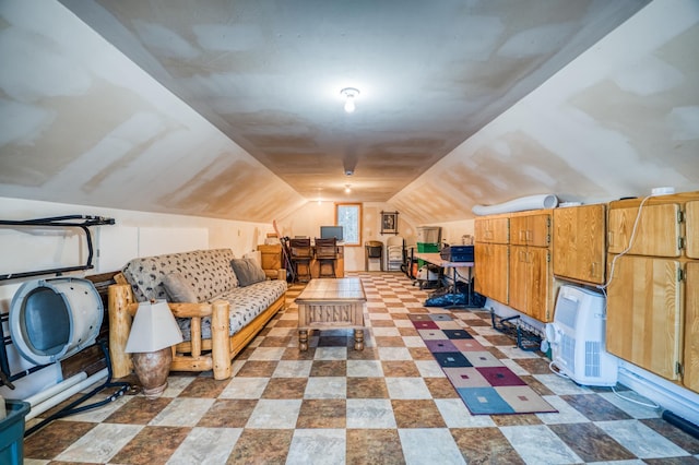 bonus room featuring vaulted ceiling