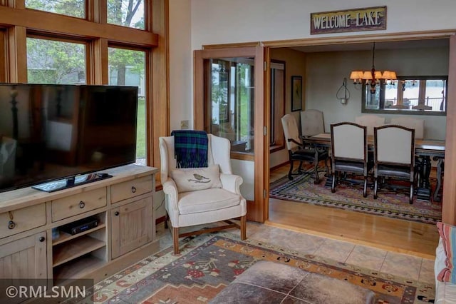 802 Flos Ct, Lincoln Twp, WI 54001 - sitting room with a chandelier and tile patterned floors