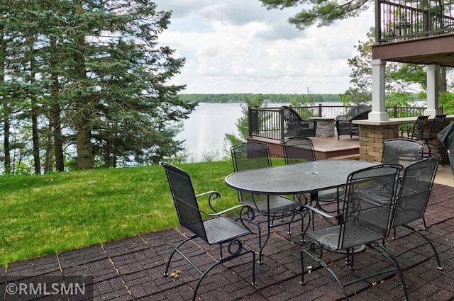 802 Flos Ct, Lincoln Twp, WI 54001 - view of patio with a deck with water view and outdoor dining space