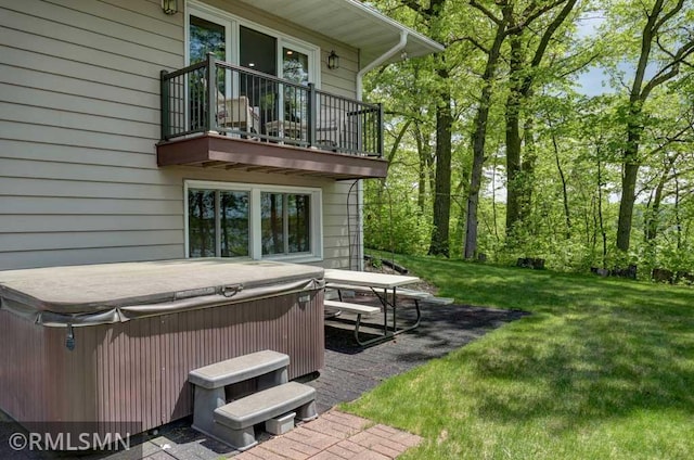 802 Flos Ct, Lincoln Twp, WI 54001 - view of green lawn with a hot tub, a balcony, and a patio area